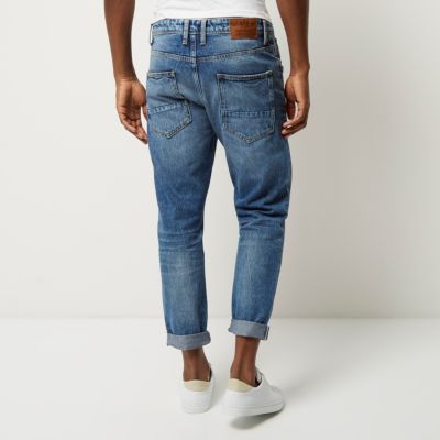 Mid wash patchwork Jimmy slim tapered jeans